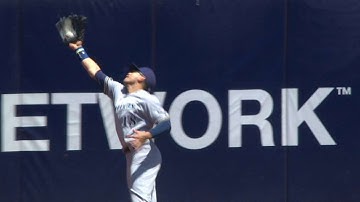 MIL@OAK: Flores makes a nice catch, crashes into wall