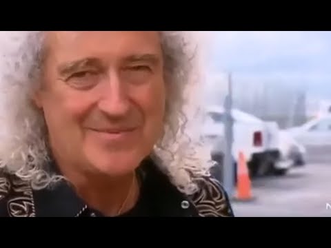 Queen's Brian May Shoves Camera Out Of Reporter's Hand