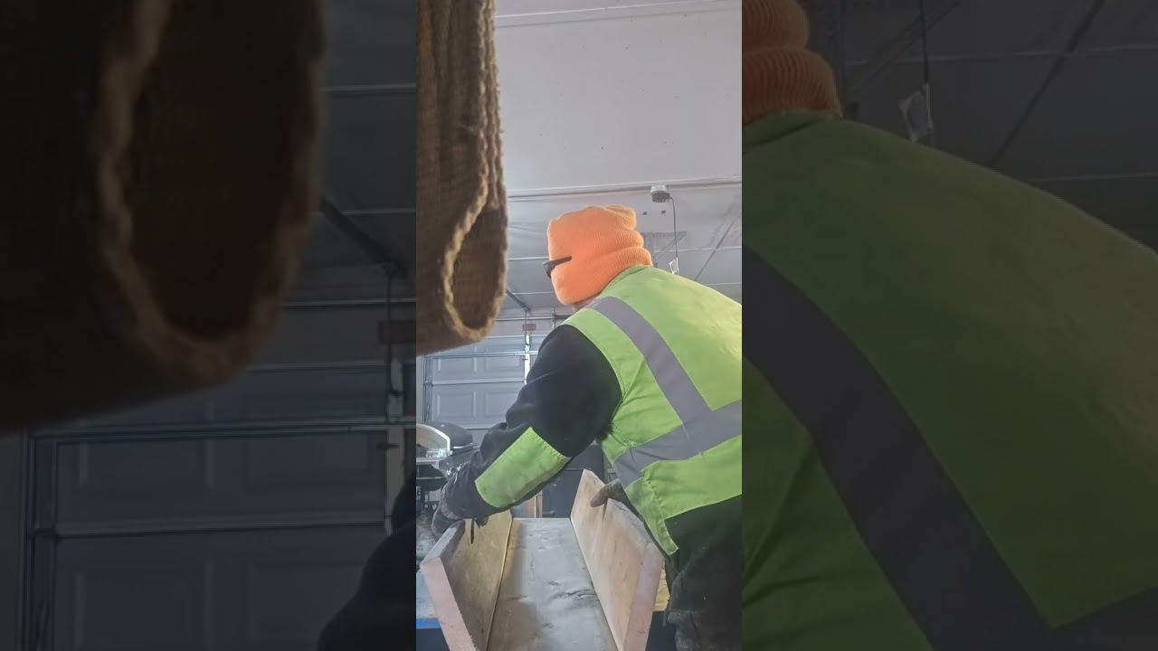 Making feeder troughs for pigs or other animals out of reclaimed wood.