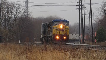 CSX intermodal train with yn2 dash 8 leading with low ditch lights
