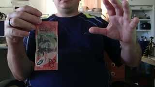 Levitating $20:00 Note from hand to hand
