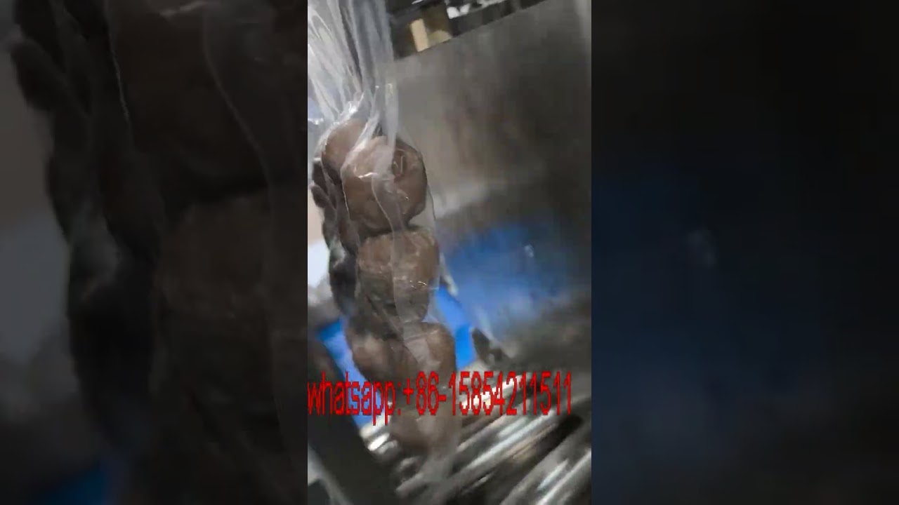 Meat ball weighing and packaging machine