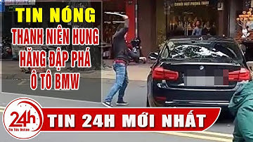 Thanh niên cầm gậy sắt đập phá xế sang BMV trên phố. Công an đang điều tra Tin mới nhất