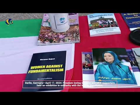 Berlin, Germany—April 17, 2024: MEK supporters exhibition  in solidarity with the Iranian Revolution