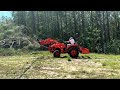 Practicing using the grapple with my new Kubota L2502 tractor