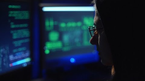 Female Hacker Working With Computers Stock Video