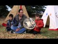 Michael Spears singing with kids drumming