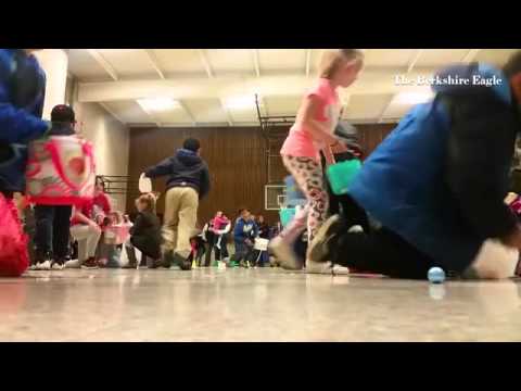 Kids race to grab as many Easter eggs as they can at Morningside Community School. @berkshireeagle