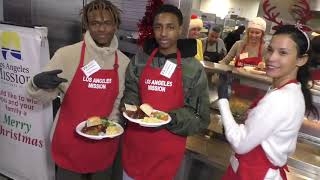 Kailand Morris and Mandla Kadjay Carl Stevland Morris volunteer at the 2019 Christmas Celebration On