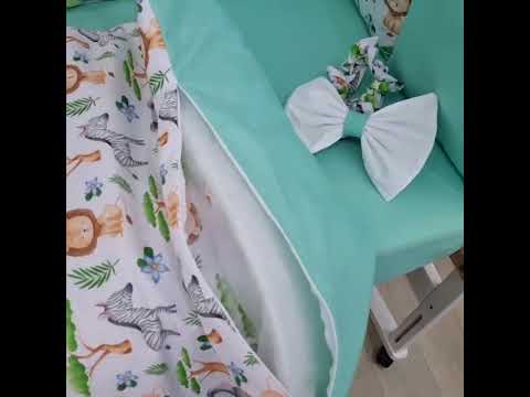 Комплект постільної білизни з ковдрою та бортиками на 3 сторони ліжечка 120х60см - З принтом Левенята м'ятні, видео 1