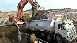 BIG Excavator Digging Loading Coal Into Dump Truck Komatsu PC2000 Hitachi EX1200