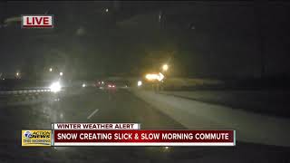 Snow creating slick and slow morning commute