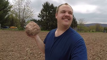 Helping local farmers by planting a test plot.