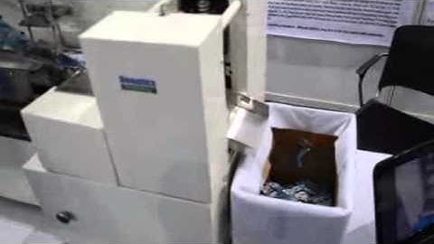 Mini (Table top) flow wrap machine.