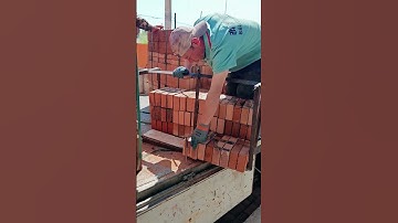 Moving a stack of bricks with a claw tool #shorts