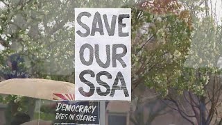 Johnson County, Kansas residents rally in protest against federal cuts