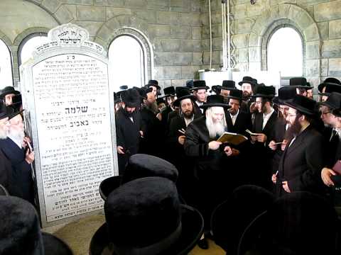 Bobover Rabbi Saying Kaddish At His Father's Grave...