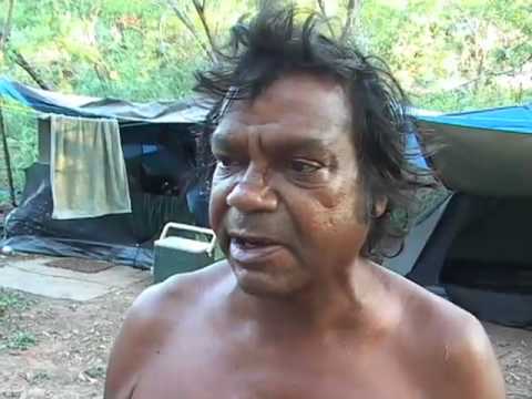 A first hand look at 'Long Grassers' who are living rough, in parks or in bush areas in Darwin, NT. The clip tells the story of several men and women who are living in the scrub, three kilometres from the centre of Darwin beside the Stuart Highway. Lord Mayor Graeme Sawyer visits the camp and gives the 'Long Grassers' his support. Filmed, written and edited by Justin B. O'Brien. 21/2/2010