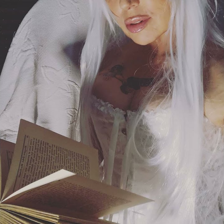 reader storyteller book narrator lips face corset white bride hair