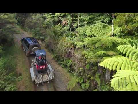 2024 Land Rover Defender 110 towing trailers off-road in New Zealand (drone footage)