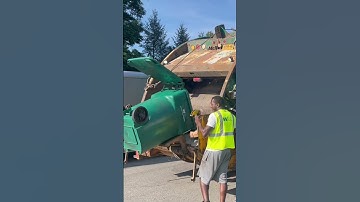 waste management rear loader garbage truck