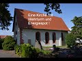 Eine Kirche mit Wehrturm und Energiespot