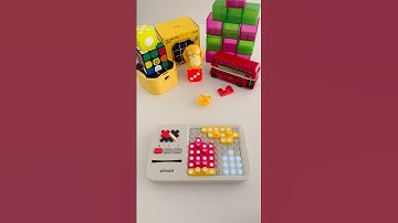 The way to play: GiiKER Super Blocks. You have to cover the lit parts to solve the puzzle.