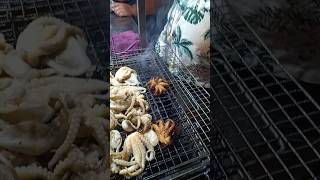 cambodia Night time street food Squid BBQ .