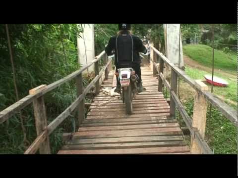 Ian crossing the Ropey Bridge in Northern Thailand