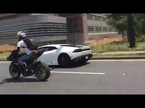 2015-lamborghini-huracan-races-a-biker-gang