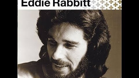 Thumbnail of Eddie Rabbitt - Drivin' My Life Away (Lyrics on screen)