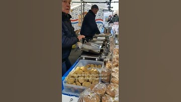 Stroopwafels freshly made Albert cuypmarket Amsterdam | street food | Amsterdam stroopwafels