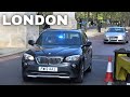 Unmarked police cars in convoy and other emergency vehicles in London