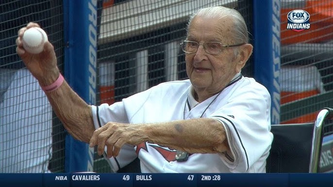 Transplant survivor tosses first pitch at Cardinals game