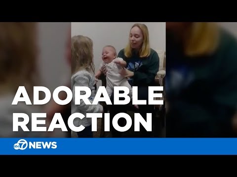 Baby hears sister's voice for the first time