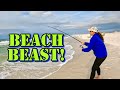 Girl catches a beast while surf fishing