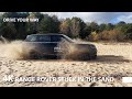 New range rover stuck in the sand  will it be able to get out