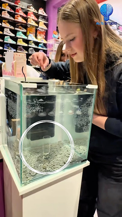 Challenge of putting coins in a glass in the water to get free shoes