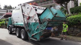 Autocar WXLL McNeilus Rear Loader with Dumpster Arms