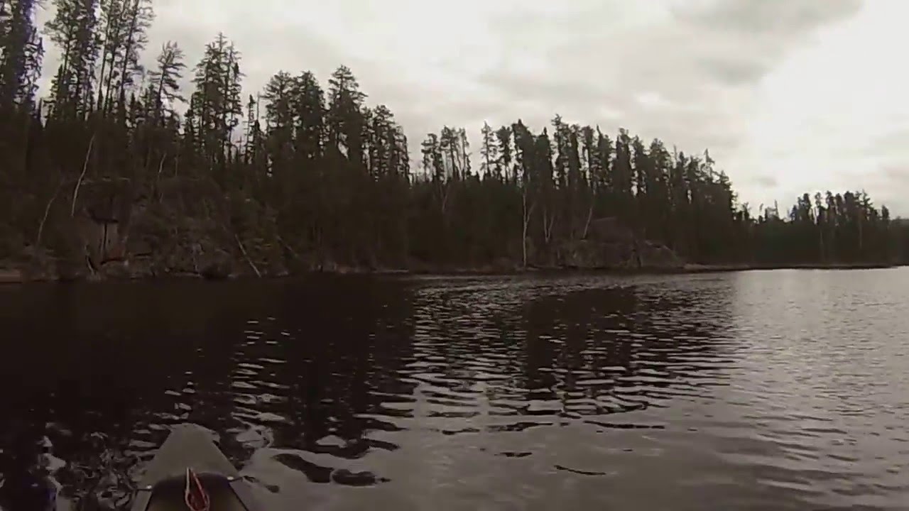 Paddling south Lucky Pay Lake and examining interesting cliff