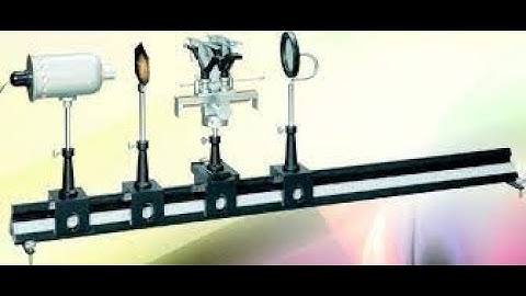 To determine the focal length of the combination of two lenses with the help of a nodal slide exp