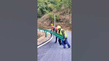 Install metal guardrails along the road