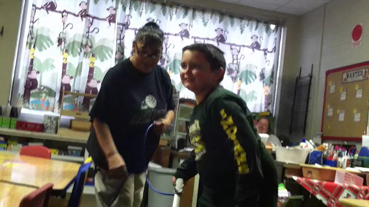 cameron helping Rebecca vacuum