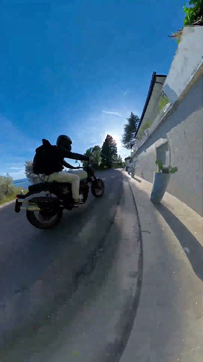Motorcyclist's Camera Smashes Into Roadside Planter || ViralHog