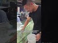 Catching live prawns and crabs at a seafood buffet in Thailand