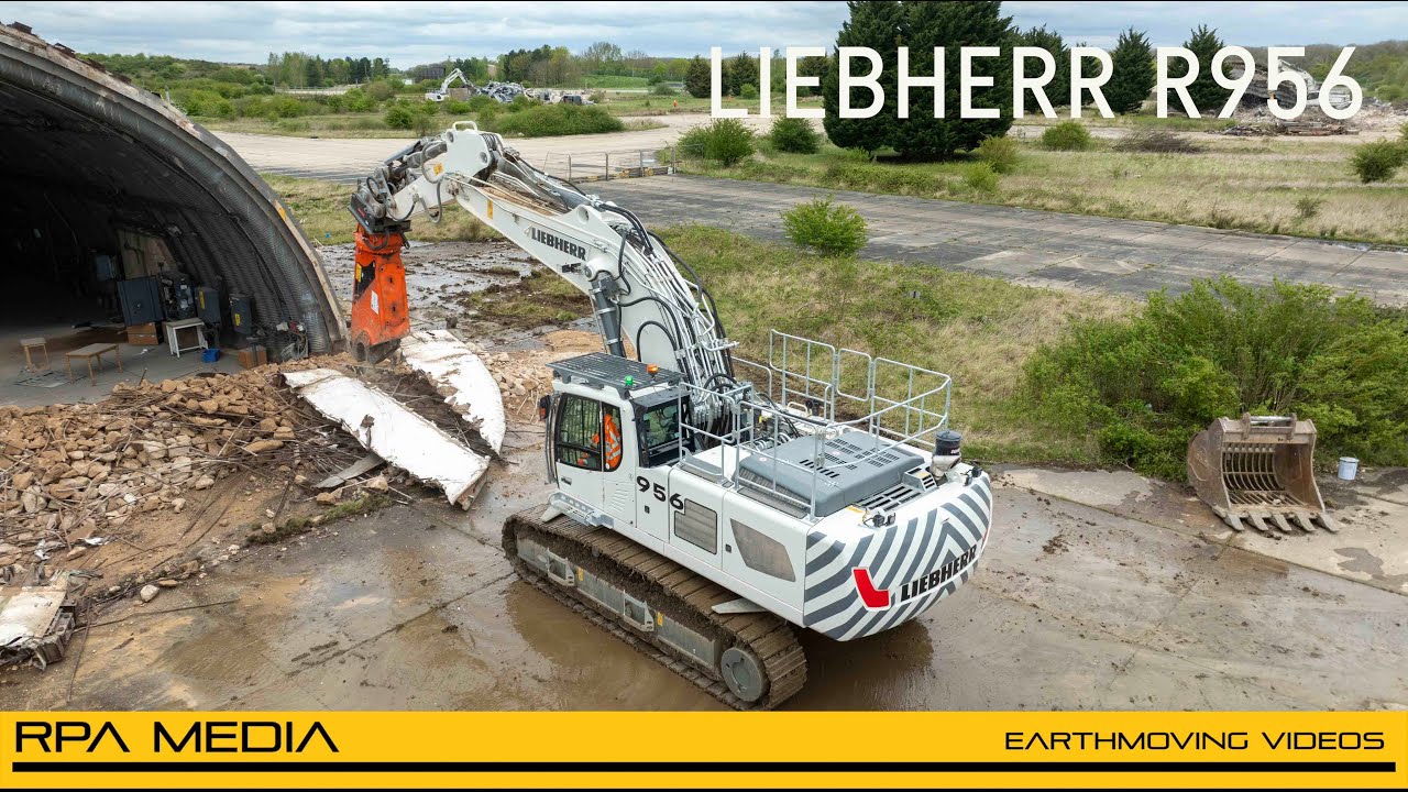 NEW Liebherr R 956 excavator demolishing aircraft hangars
