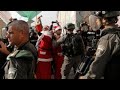 Protests put damper on Christmas in Bethlehem Palestinians try to use the holiday to make a political statement; Conor Powell reports from Jerusalem.