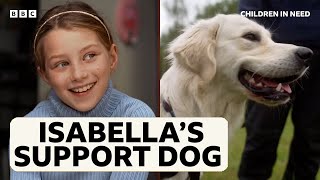 Isabella and her assistance dog, Storm