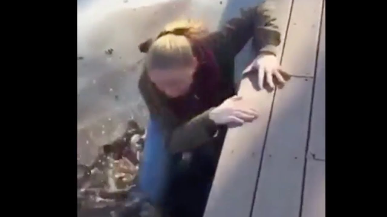 Girl falls through ice...friend laughs. YouTube