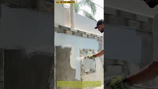 High-Speed Exterior Paint Application: Using Airless Spray Technology on a Building Facade